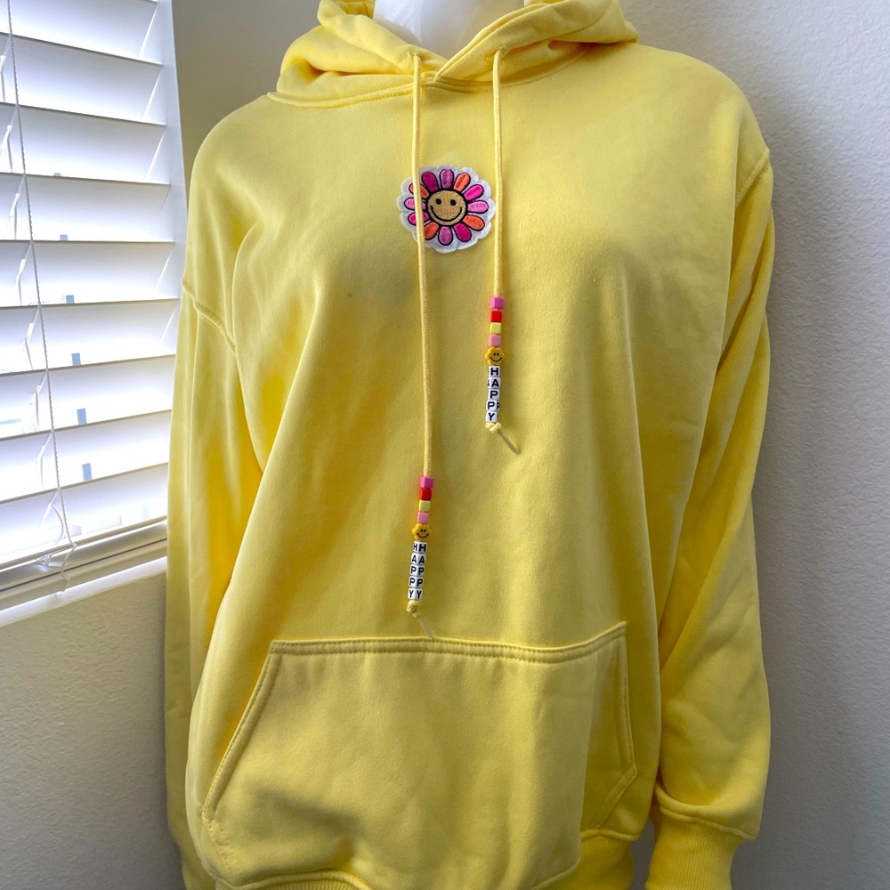 BRAND NEW super cute yellow HAPPY hoodie NWOT